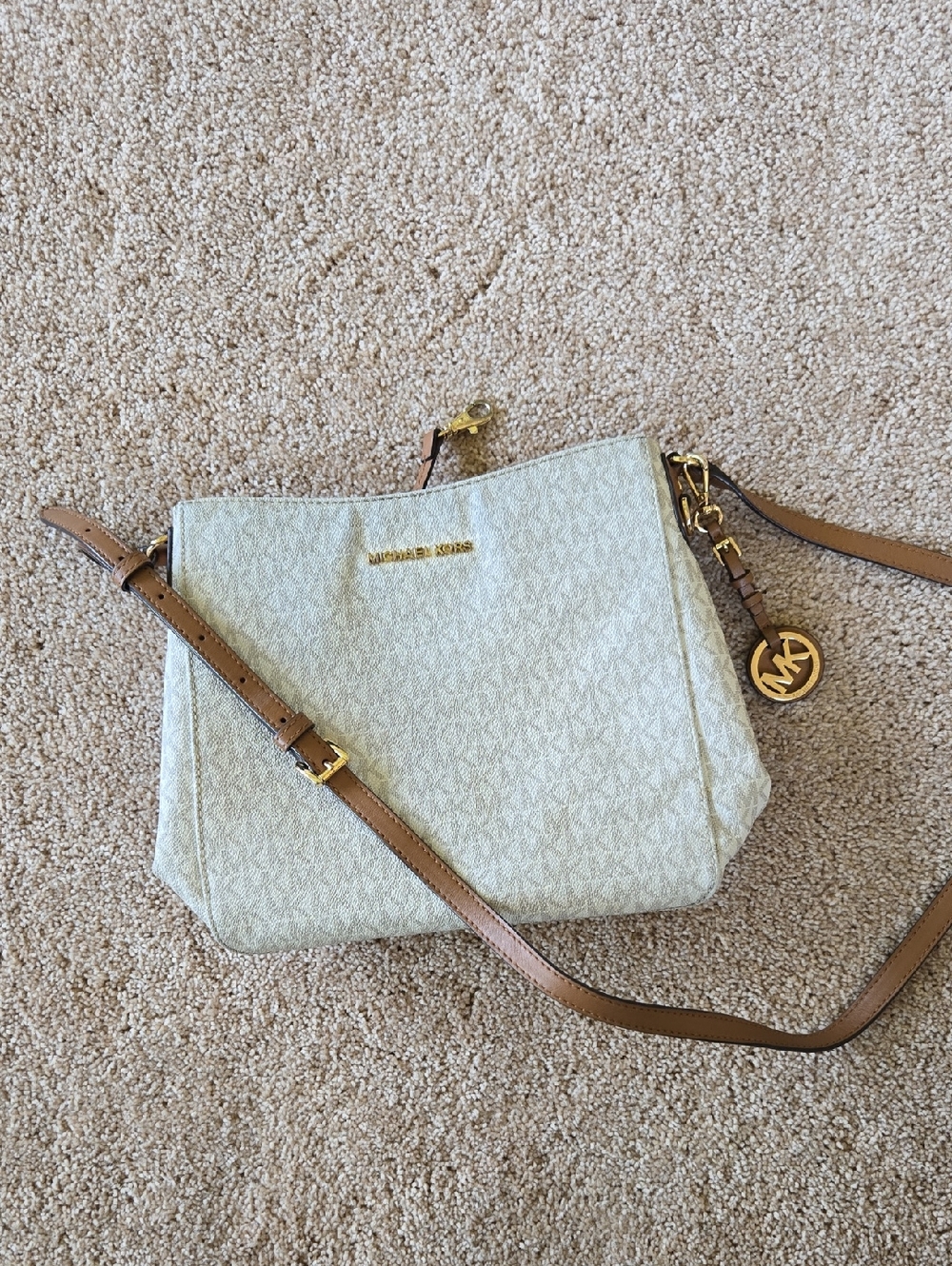Michael Kors Cream Signature Crossbody Messenger bag with Tan Strap